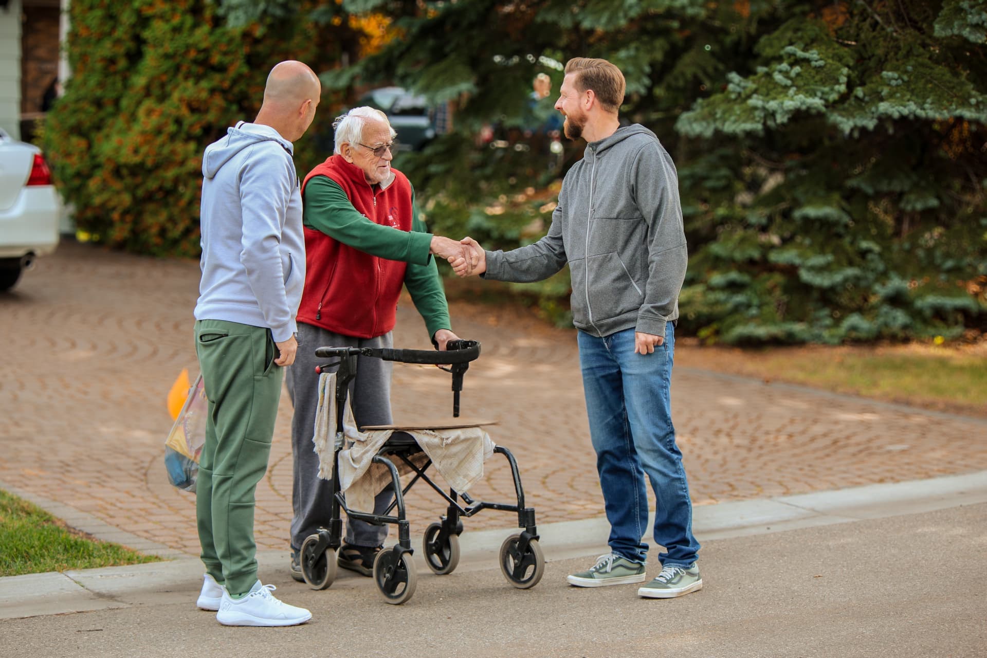Kyle Kaswski shaking hands with a constituent