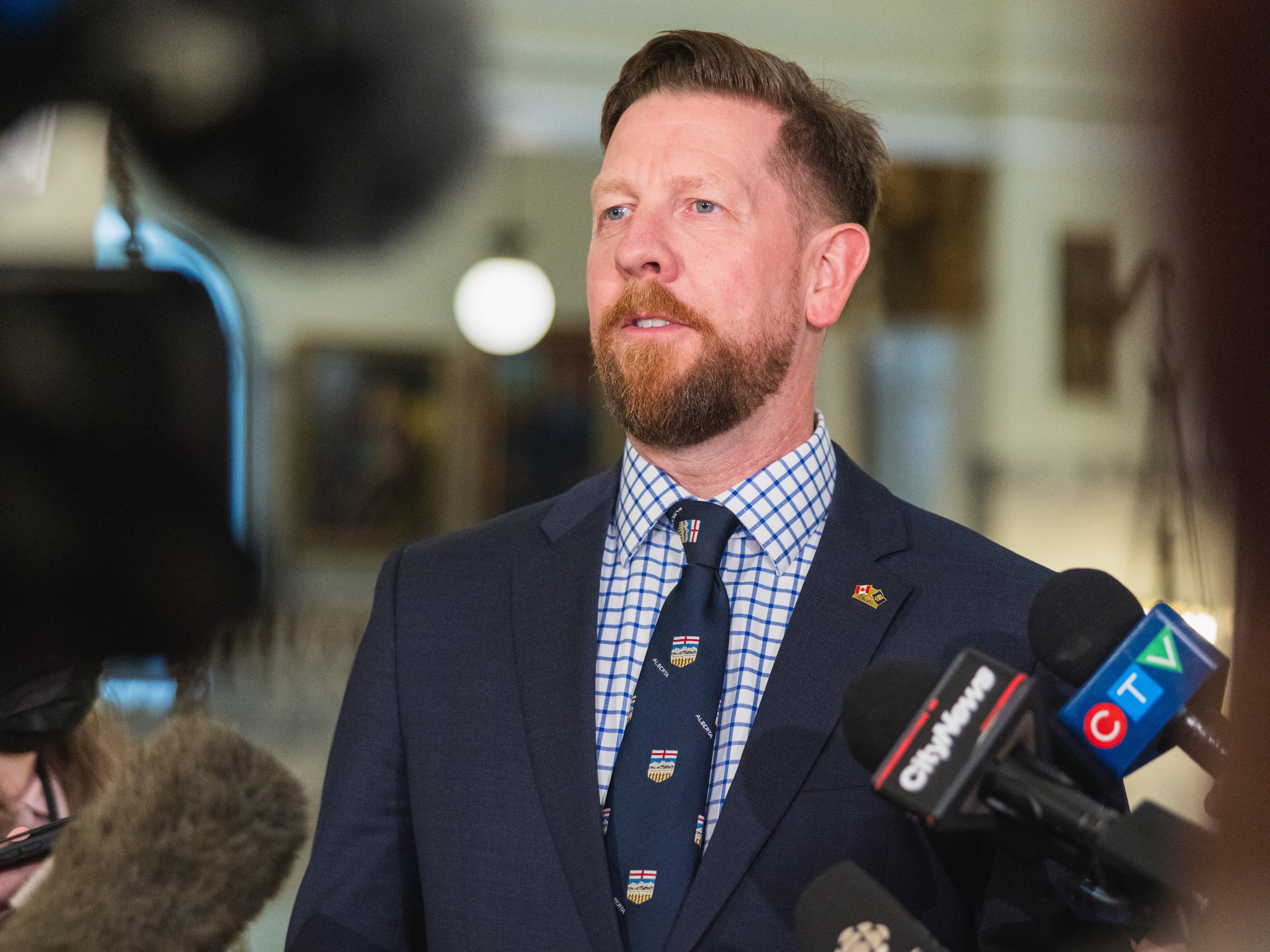 MLA Kyle Kasawski speaks to media at the Legislature.